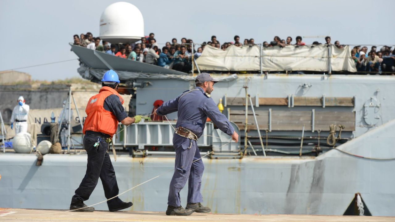 east african refugees arrive italy 1