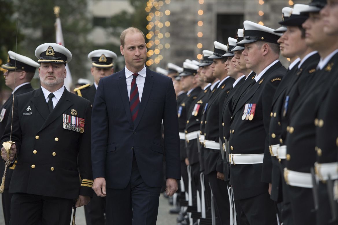 William inspects an honor guard during the welcome ceremony on September 24.