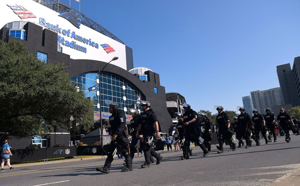 Charlotte-Mecklenburg police officers arrive outside of Bank of America Stadium prior to the Panthers game on September 25.