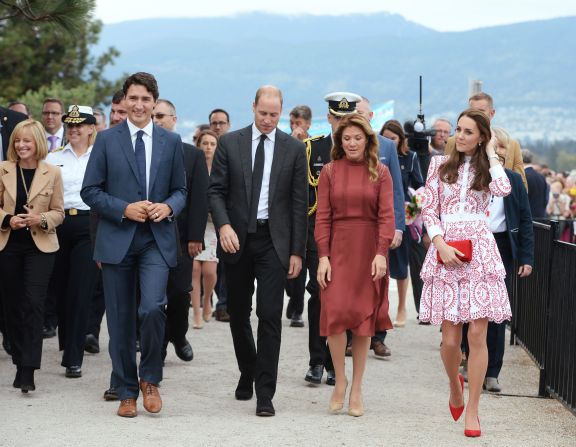 Canadian Prime Minister Justin Trudeau,  left, and his wife Sophie Gregoire Trudeau, second from right, accompany the royals on a tour of the Kitsilano Coast Guard Base in Vancouver, British Columbia, on September 25.