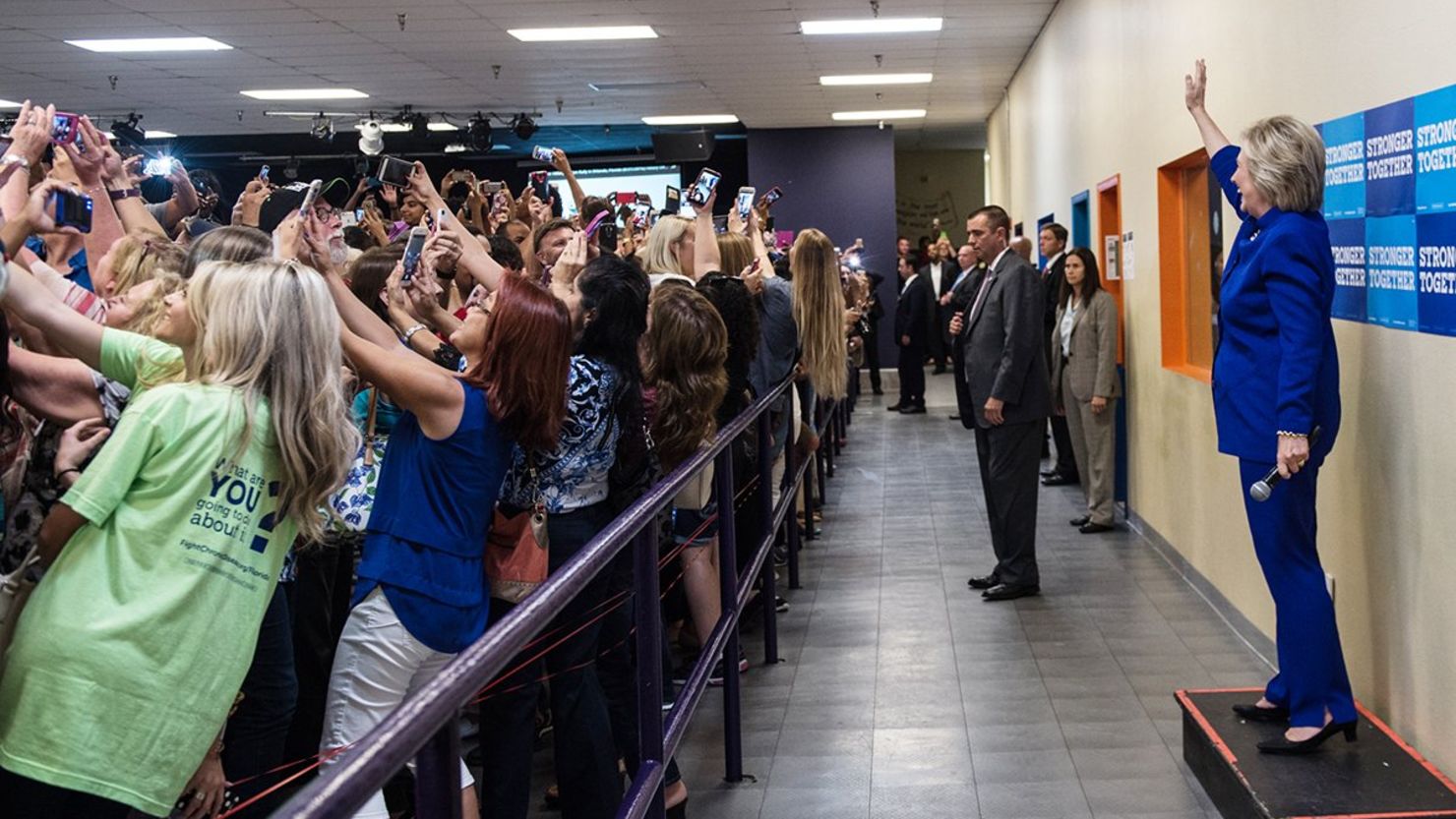 Hillary Clinton waves to a selfie-taking crowd at a recent campaign event in Orlando, Florida.