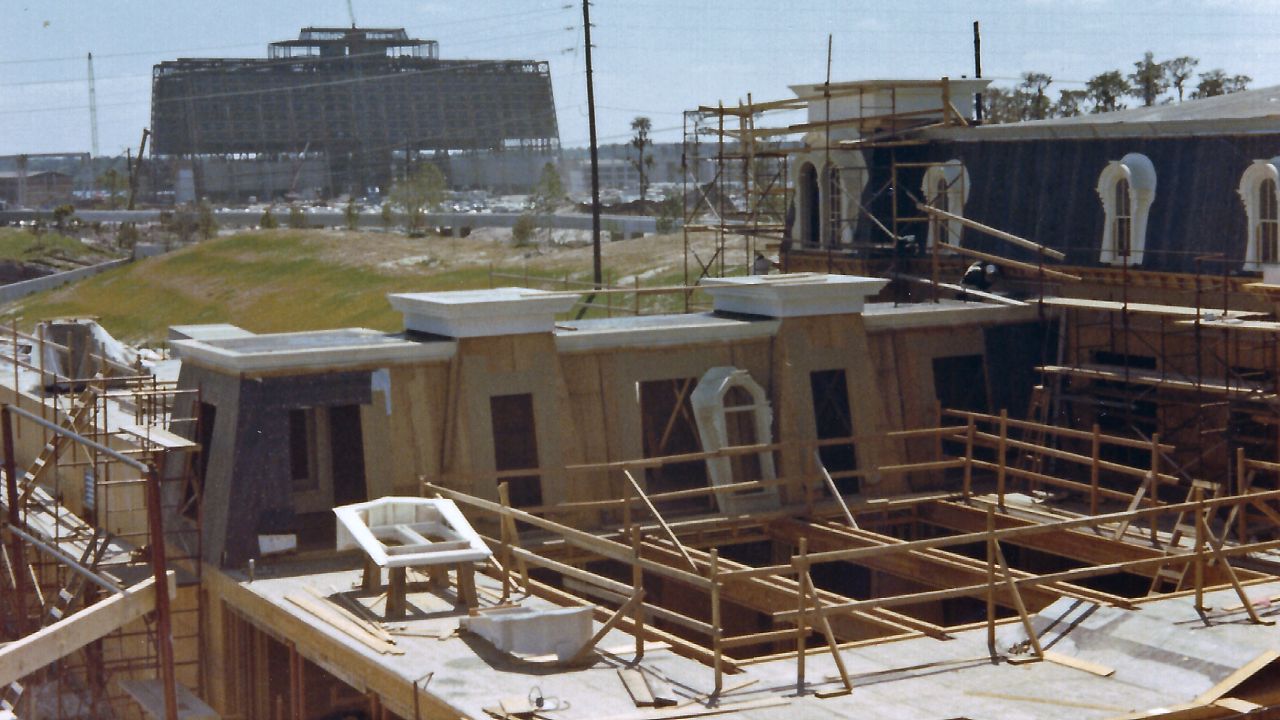 <strong>Disney's Contemporary Resort —</strong> Construction of the Contemporary Resort is seen from the top of the train station at the Magic Kingdom's main entrance. "Each of the windows were handcrafted, then placed individually," Valdes said. "The train station was full-sized and served as the 'curtain' that hid the castle from visitors until they entered the park."
