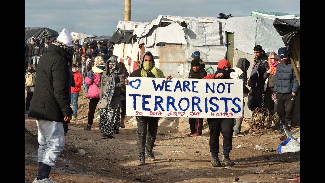 Migrants demonstrate on Monday, February 29.