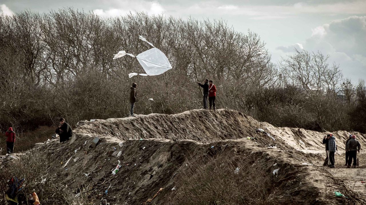 A migrant flies a kite on Friday, February 19.