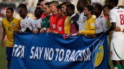 CHRISTCHURCH, NEW ZEALAND - JUNE 17: A general view of players and FIFA Officials holding a banner which reads 'FIFA Say No To Racism' prior to the FIFA U-20 World Cup Semi Final match between Brazil and Senegal at Christchurch Stadium on June 17, 2015 in Christchurch, New Zealand.  (Photo by Martin Hunter/Getty Images)
