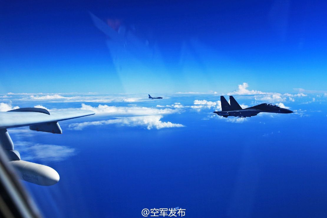 Chinese SU-30 fighters fly over the Pacific in 2016.
