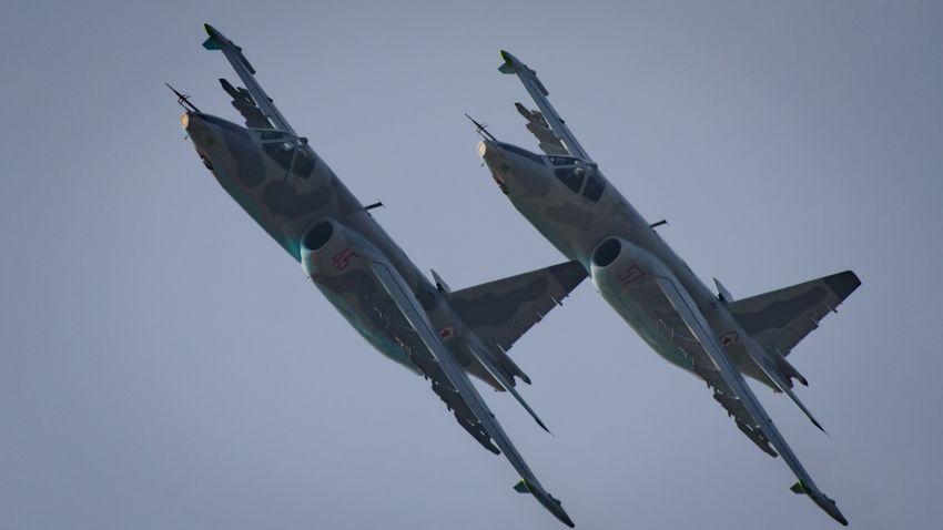 This photo taken on September 24, 2016 shows Sukhoi SU-25 aircraft performing during the first Wonsan Friendship Air Festival in Wonsan.
Just weeks after carrying out its fifth nuclear test, North Korea put on an unprecedented civilian and military air force display Saturday at the country's first ever public aviation show.
/ AFP / Ed Jones (Photo credit should read ED JONES/AFP/Getty Images)