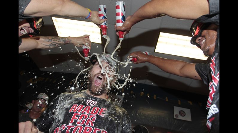 Members of the Washington Nationals pour beer on second baseman Daniel Murphy after the baseball team clinched a division title on Saturday, September 24. They've won the National League East in three of the past five seasons.