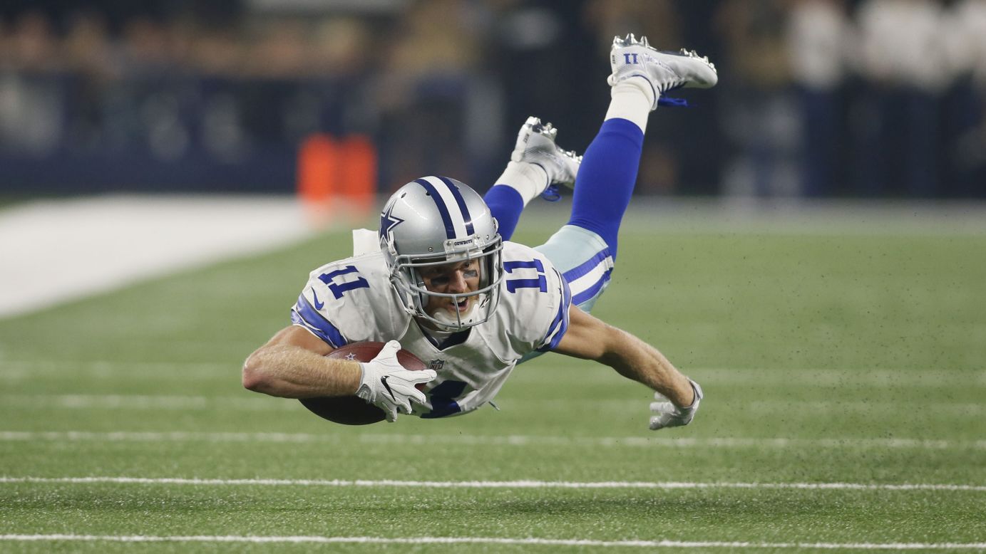 Dallas wide receiver Cole Beasley dives for more yards after a catch against Chicago on Sunday, September 25. Beasley had seven receptions in the 31-17 victory.