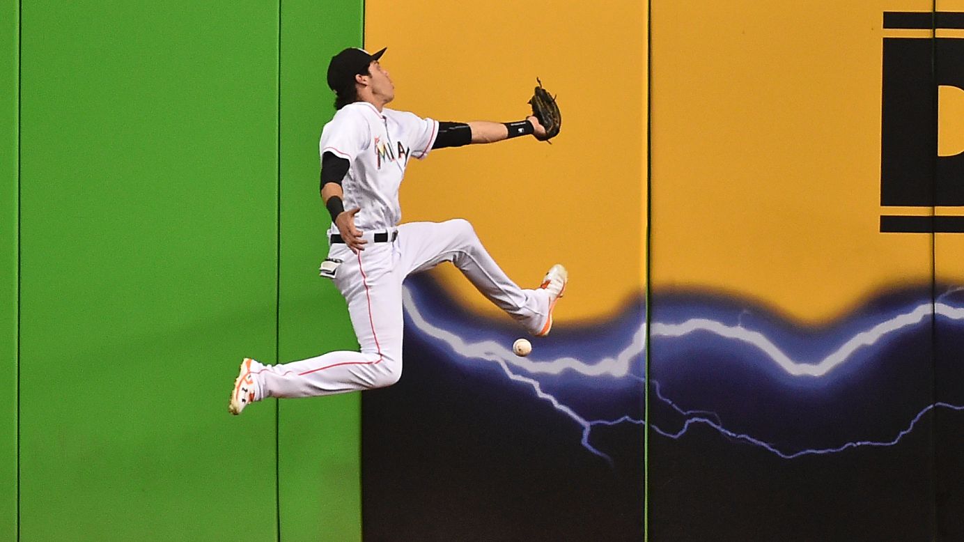 Miami left fielder Christian Yelich misplays a fly ball during a home game against Atlanta on Thursday, September 22.