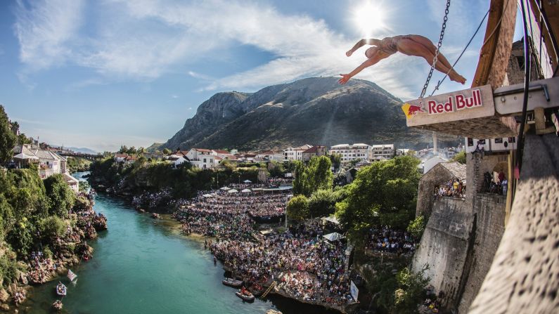 Lysanne Richard jumps from the Stari Most bridge in Mostar, Bosnia-Herzegovina, as she competes in the Red Bull Cliff Diving World Series on Saturday, September 24. Richard won the women's competition in Mostar.