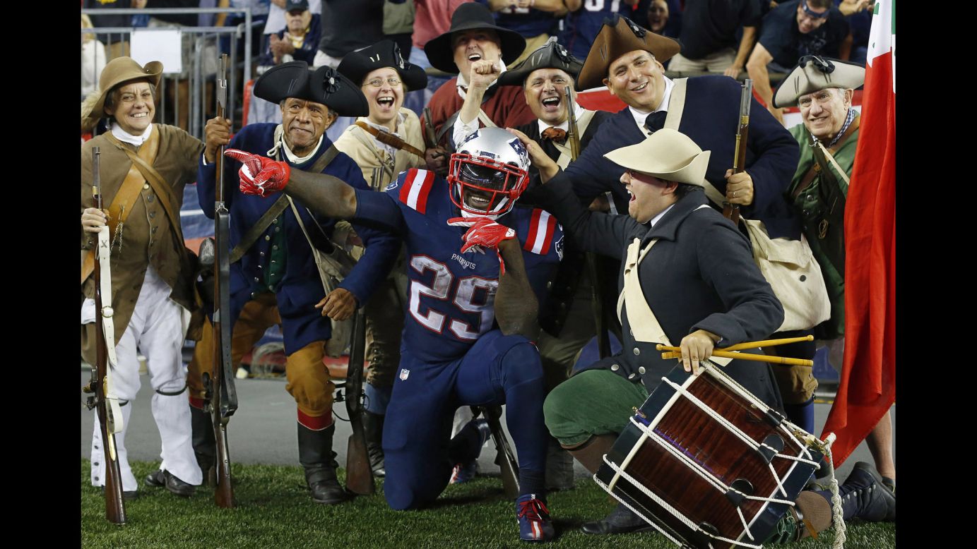 LeGarrette Blount, a running back for the New England Patriots, celebrates with the "End Zone Militia" after scoring a touchdown against Houston on Thursday, September 22. Blount had two touchdowns in the game, which the Patriots won 27-0.