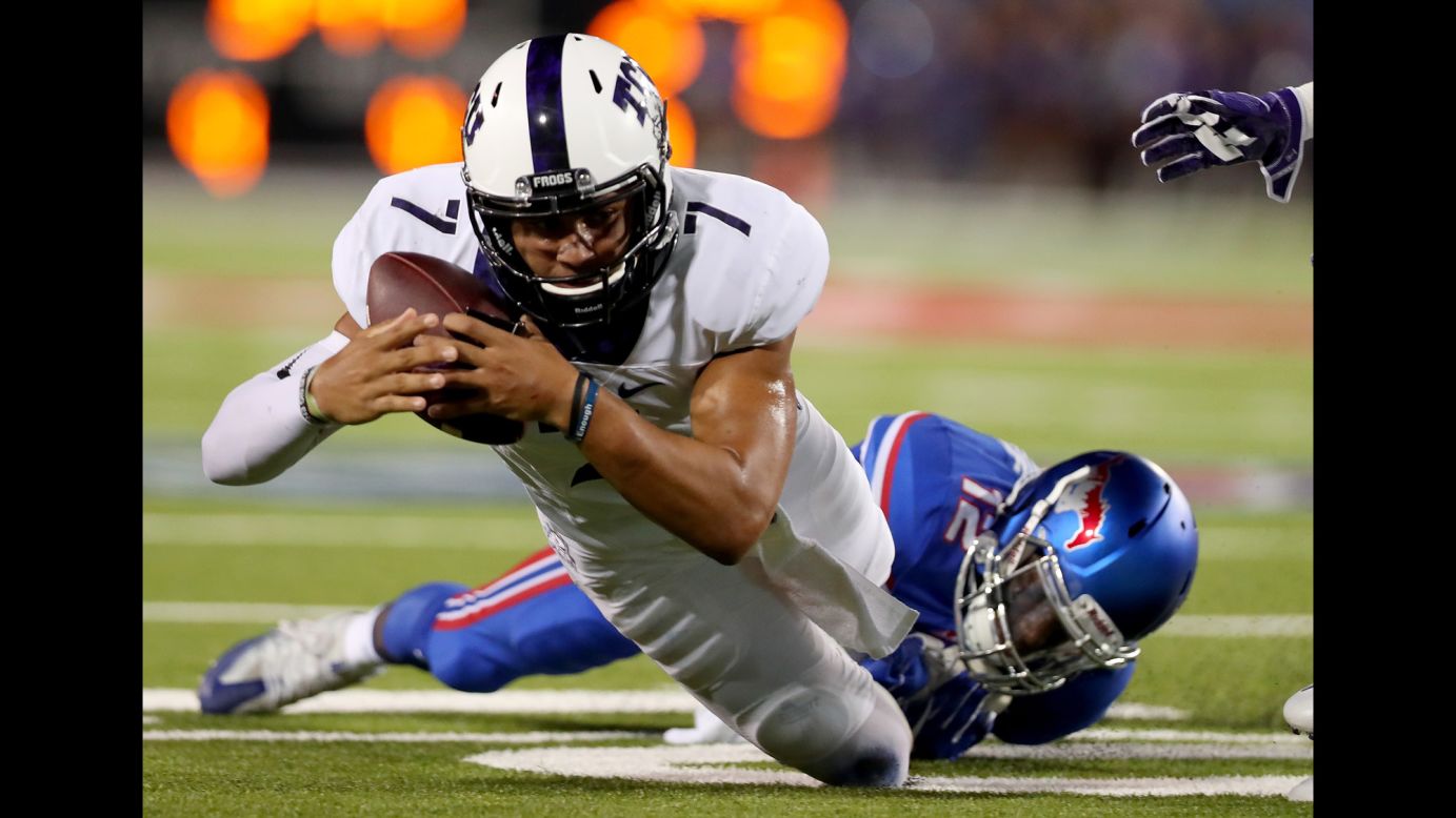 TCU quarterback Kenny Hill carries the ball against SMU during a college football game in Dallas on Friday, September 23. Hill threw for 452 yards as TCU won 33-3.