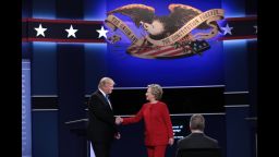 (L-R) Republican presidential nominee Donald Trump and Democratic presidential nominee Hillary Clinton shake hands prior to the start of the Presidential Debate at Hofstra University on September 26, 2016 in Hempstead, New York.  The first of four debates for the 2016 Election, three Presidential and one Vice Presidential, is moderated by NBC's Lester Holt.