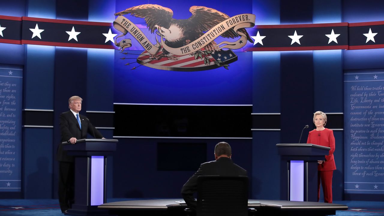 HEMPSTEAD, NY - SEPTEMBER 26:  Republican presidential nominee Donald Trump debates Democratic presidential nominee Hillary Clinton as Moderator Lester Holt (C) looks on during the Presidential Debate at Hofstra University on September 26, 2016 in Hempstead, New York.  The first of four debates for the 2016 Election, three Presidential and one Vice Presidential, is moderated by NBC's Lester Holt.  (Photo by Drew Angerer/Getty Images)