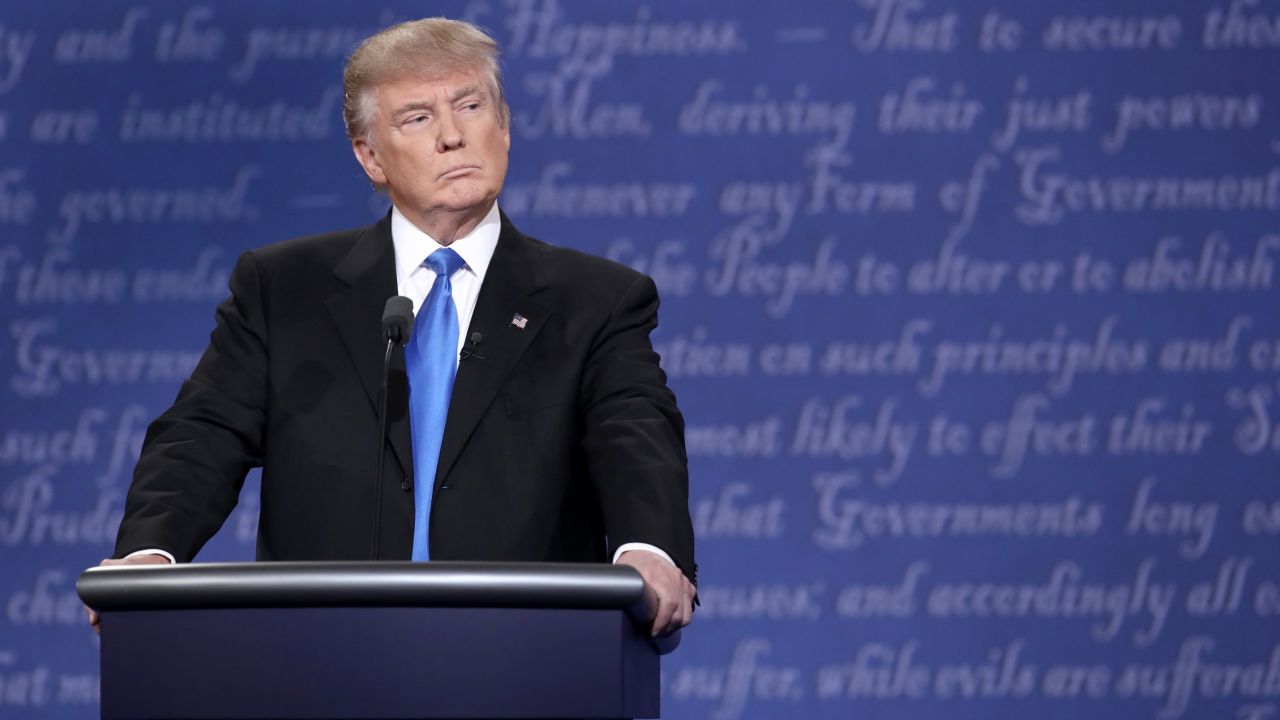 HEMPSTEAD, NY - SEPTEMBER 26:  Republican presidential nominee Donald Trump stands at his podium during the Presidential Debate at Hofstra University on September 26, 2016 in Hempstead, New York.  The first of four debates for the 2016 Election, three Presidential and one Vice Presidential, is moderated by NBC's Lester Holt.  (Photo by Win McNamee/Getty Images)