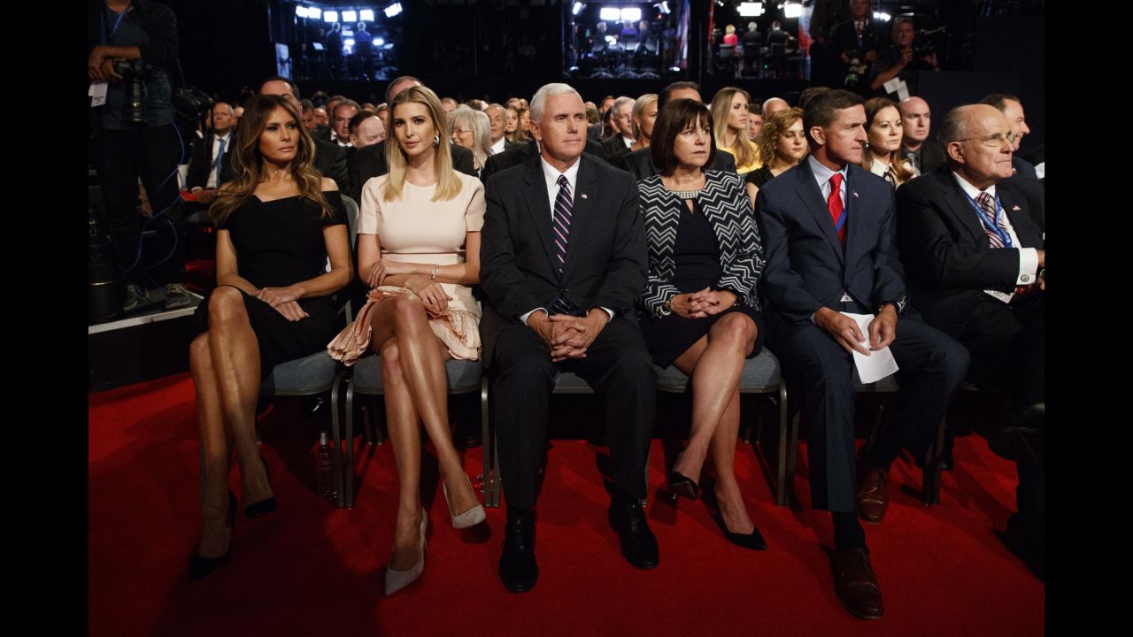 From left, in the front row, are Melania Trump; Trump's daughter Ivanka Trump; Trump's running mate, Indiana Gov. Mike Pence; Pence's wife, Karen; retired U.S. Army Gen. Michael Flynn; and former New York Mayor Rudy Giuliani.