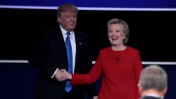 HEMPSTEAD, NY - SEPTEMBER 26:  (L-R) Republican presidential nominee Donald Trump and Democratic presidential nominee Hillary Clinton shake hands after the Presidential Debate at Hofstra University on September 26, 2016 in Hempstead, New York.  The first of four debates for the 2016 Election, three Presidential and one Vice Presidential, is moderated by NBC's Lester Holt.  (Photo by Drew Angerer/Getty Images)