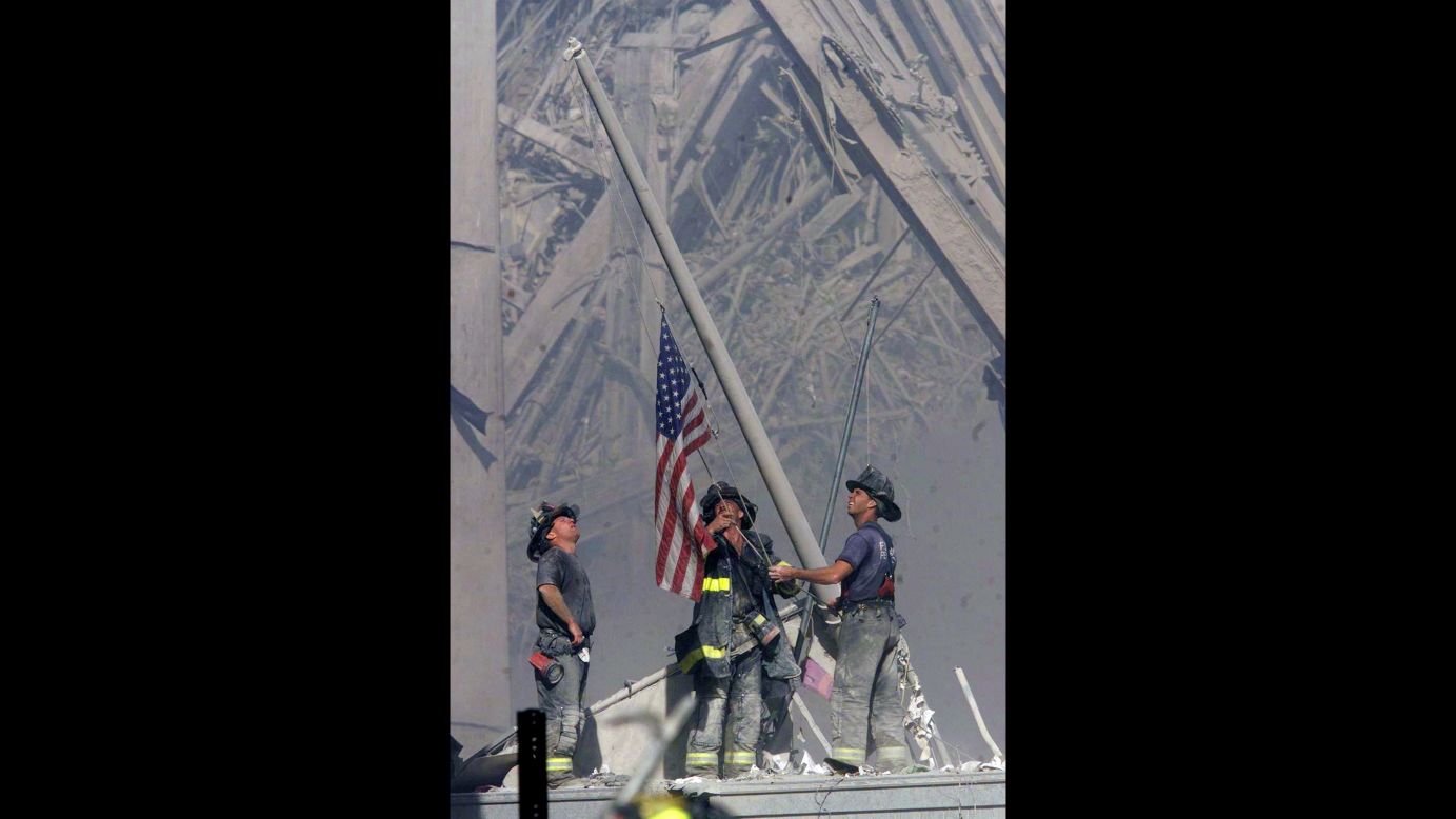 Firefighters George Johnson, Dan McWilliams and Billy Eisengrein raise a flag at the site of the World Trade Center in New York after the terror attacks on September 11, 2001. The scene was immortalized by photographer Thomas E. Franklin and has been compared to the iconic image of the flag-raising at Iwo Jima. <a href="http://www.cnn.com/SPECIALS/us/cnn-films-the-flag/index.html">CNN Films' "The Flag"</a> examines what happened to the flag at ground zero and explores its impact in the aftermath of the tragedy.