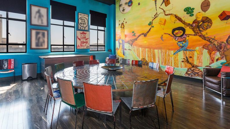 Johnny Depp has put his Los Angeles residence on the market for $12.7 million. The spectacular property shows the actor's love of art, including this eye-catching mural by Brazilian artist twins OSGEMEOS, which takes up an entire wall of the dining room. 