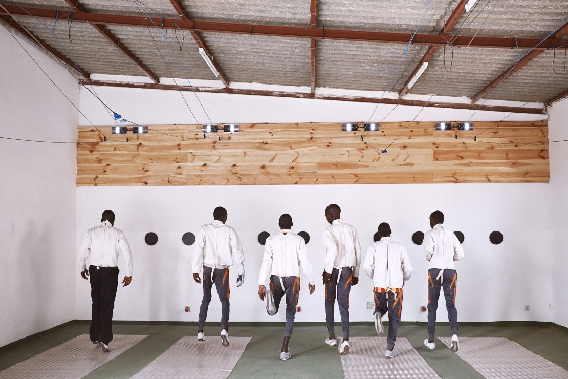 Senegal's incarated youths begin warm up practice before fencing sessions start.