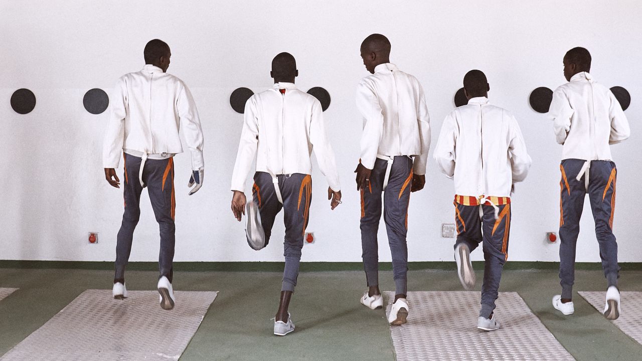 Senegal's incarated youths begin warm up practice before fencing sessions start.