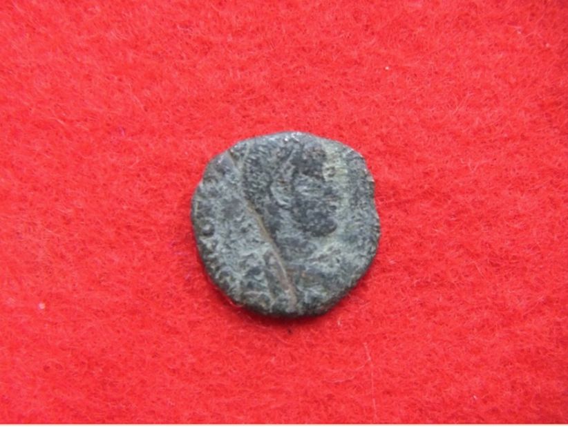 Ancient Roman coins were recently discovered in Okinawa, Japan. This image shows the front of a Roman coin.