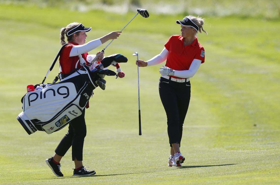 Caddies have 45 pounds of golf gear to carry around.