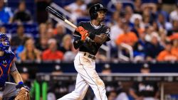 MIAMI, FL - SEPTEMBER 26: Dee Gordon of the Miami Marlins at bat during the game against the New York Mets at Marlins Park on September 26, 2016 in Miami, Florida. Dee, a left handed batter, hit his first career home run on the second pitch of the game. For the first pitch, he wore Jose Fernandez' batting helmet and stood in the right handed batter's box to honor the late pitcher.  (Photo by Rob Foldy/Getty Images)