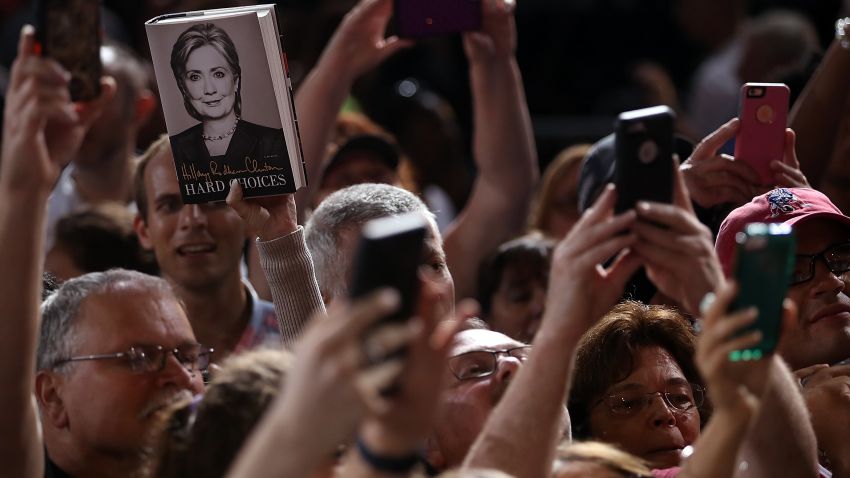 TAMPA, FL - JULY 22: Supporters take pictures with their cell phones of democratic presidential candidate former Secretary of State Hillary Clinton during a campaign rally on July 22, 2016 in Tampa, Florida. With three days to go until the Democratic National Convention, Hillary Clinton is campaigning in Florida. (Photo by Justin Sullivan/Getty Images)