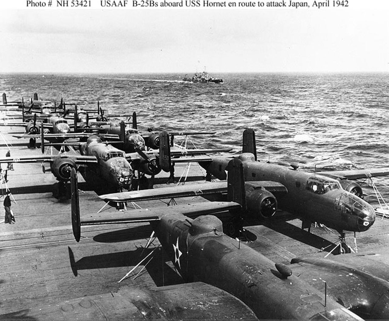 As revenge for Japan's attack on Pearl Harbor, 80 US pilots, gunners, navigators and bombardiers led by Lt. Col. James "Jimmy" Doolittle performed a daring one-way mission to bomb Japan in 1942. Half of the mission's 16 North American B-25 Mitchell bombers are seen here parked on the flight deck of the USS Hornet. Click through the gallery to see more images of the raid.