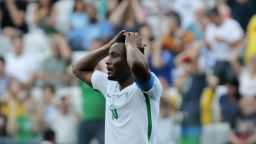 Nigeria's John Obi Mikel reacts during the Rio 2016 Olympic Games men's football semifinal match against Germany at the Corinthains Arena in Sao Paulo, Brazil, on August 17, 2016. / AFP / Miguel SCHINCARIOL        (Photo credit should read MIGUEL SCHINCARIOL/AFP/Getty Images)
