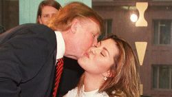 NEW YORK, NY - JANUARY 28:  Miss Universe, Venezuela's Alicia Machado, kisses Donald Trump, owner of the Miss Universe pageant, 28 January during her daily fitness workout at a health center in New York. The 19 year-old Machado started a new fitness program after she was criticized for gaining weight after winning the 1996 Miss Universe pageant. She claims to have lost five pounds in three days. AFP PHOTO Jon LEVY  (Photo credit should read JON LEVY/AFP/Getty Images)