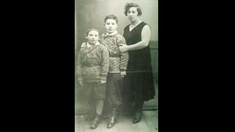 Shimon Peres was born on August 2, 1923 in Wisniew, Poland, where he lived before his family migrated to British-mandate Palestine in 1932. He is pictured here, center, with his mother, Sarah, and younger brother Gershon.