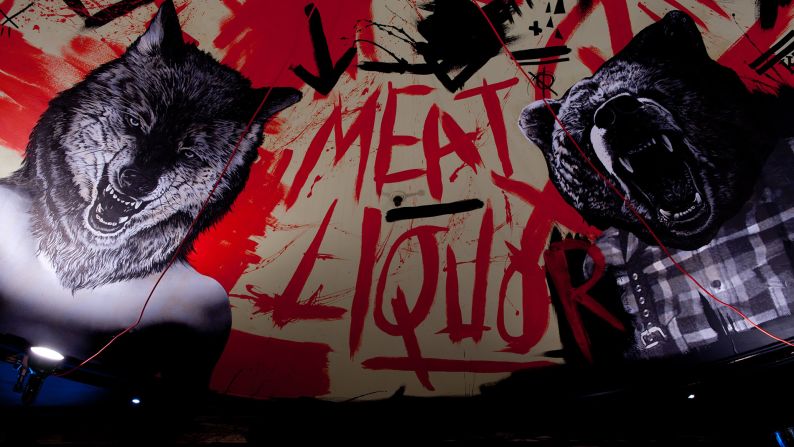 With occult-inspired and "bloody" interiors, MEATliquor serves US-style heavy, meaty meals with loud, heavy metal music.<br />