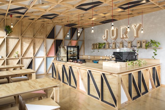 The bright white interiors and blond timbers of the Jury cafe, located in the new Pentridge Prison redevelopment, sit in stark contrast to its dark past as an infamous prison.