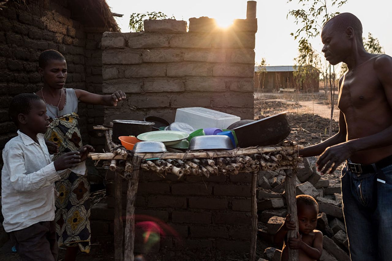 An estimated 6.5 million Malawians -- 39% of the population -- face food shortages and nutrition risks due to the ongoing drought.<br /><br />Pictured here, a family in one of the affected areas prepare their dinner.