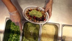 MIAMI, FL - APRIL 27:  Chipotle restaurant workers fill orders for customers on the day that the company announced it will only use non-GMO ingredients in its food on April 27, 2015 in Miami, Florida.  The company announced, that the Denver-based chain would not use the GMO's, which is an organism whose genome has been altered via genetic engineering in the food served at Chipotle Mexican Grills.  (Photo by Joe Raedle/Getty Images)