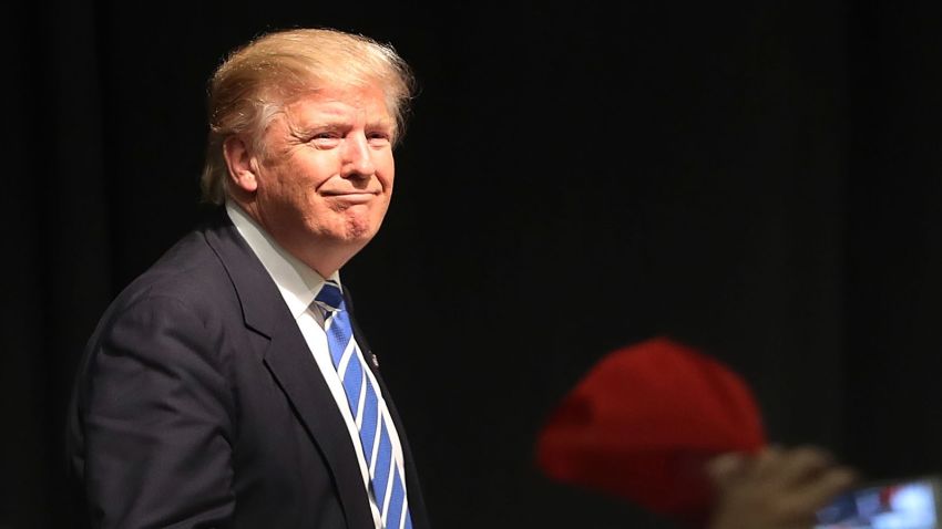 Donald Trump walks on stage at a rally on September 28, 2016 in Council Bluffs, Iowa. Trump has been campaigning today in Iowa, Wisconsin and Chicago.