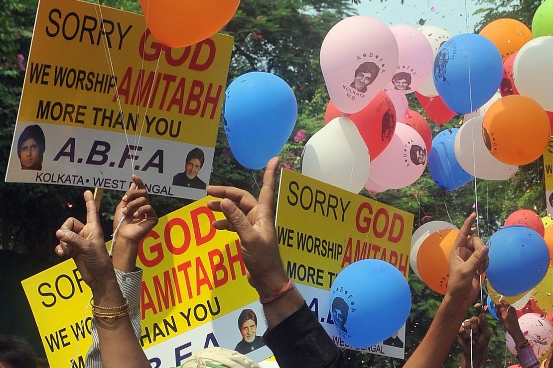 Fans wait outside the Bollywood megastar's residence on his 70th birthday in Mumbai in 2011. 