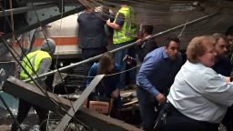 Passengers rush to safety after a NJ Transit train crashed in to the platform at the Hoboken Terminal September 29, 2016 in Hoboken, New Jersey.