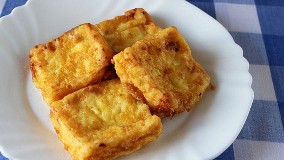 Milk, egg yolks and flour are whipped up, chilled and solidified before being coated in breadcrumbs and fried to create leche frita, one of the most popular desserts in Spain.