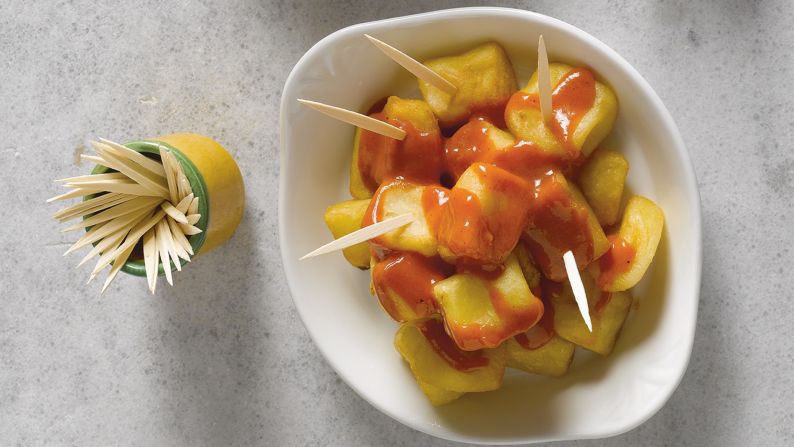 Patatas bravas are made of shallow-fried potato cubes coated in a spicy sauce. (Image credit: "Quick & Easy Spanish Recipes" by Simone and Inés Ortega, Phaidon, <a href="index.php?page=&url=http%3A%2F%2Fphaidon.com" target="_blank" target="_blank">phaidon.com</a>)