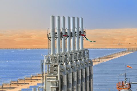 Perhaps the most ambitious project is SHAMS 1, a stand-alone 2.5km², 100MW Concentrated Solar Power plant. This plant was built about 100km from Masdar, at an estimated cost of US$600m. It is one of the largest of its type in the world, and displaces 175,000 tonnes of CO₂ annually -- equivalent to the emissions of 29,000 UK homes.