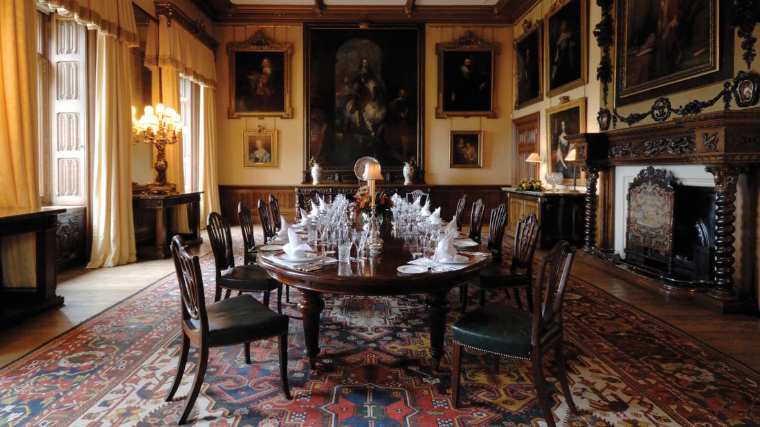 <strong>The State Dining Room: </strong>At the back of the State Dining Room hangs a portrait of King Charles I by Van Dyck, flanked by portraits of Carnarvon ancestors. 