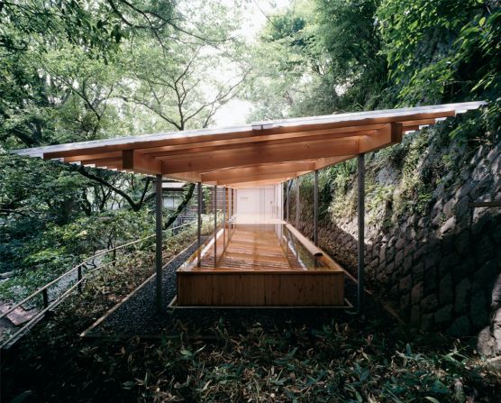 With a transparent canopy and use of wood, Kengo Kuma's Horai bathhouse takes inspiration from traditional Japanese hot springs.  