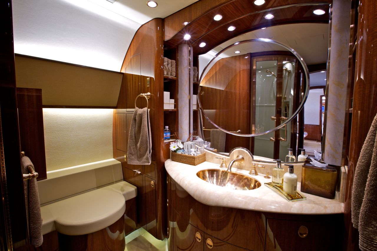 <strong>Bathroom on the Comlux Airbus ACJ 319:</strong> "Some of the people that fly in these large corporate jets may own already a smaller aircraft for their solo business trips, but may buy or rent a larger aircraft for when they travel with the family or a larger entourage," adds Gaona.