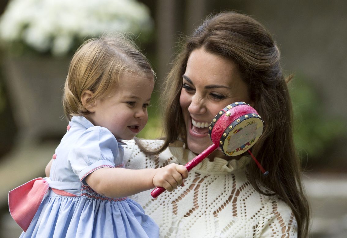 The duchess and Princess Charlotte enjoy the fun during the party on September 29. 