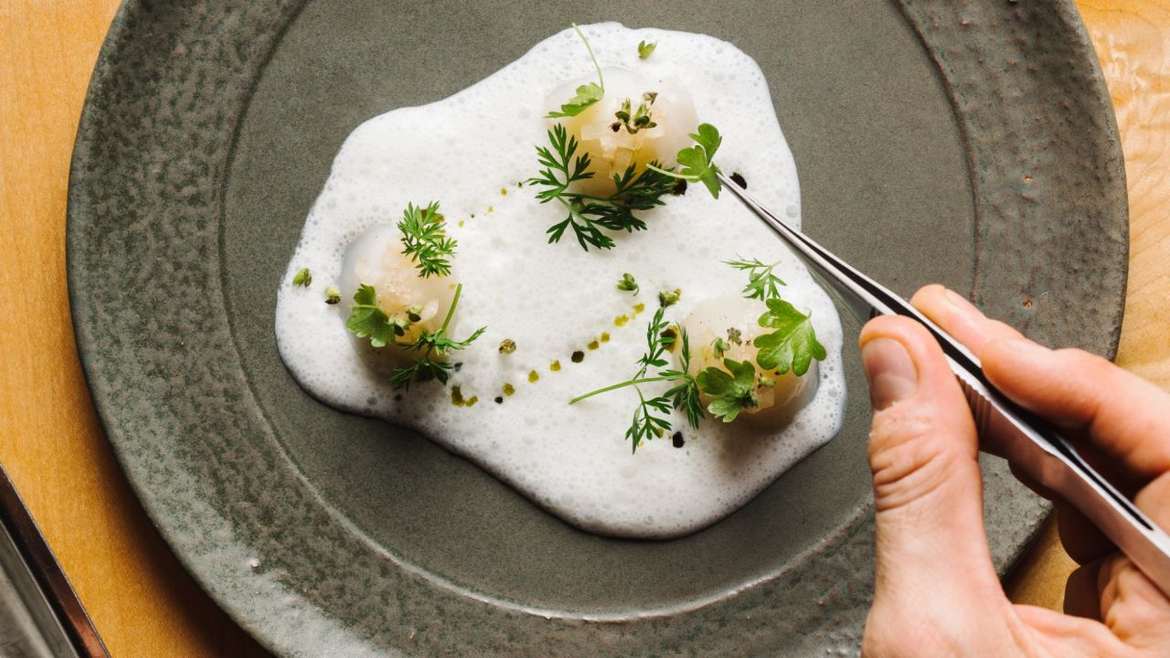 This scallop and melon dish appeared on a menu at Bastion, a restaurant from chef Josh Habiger.