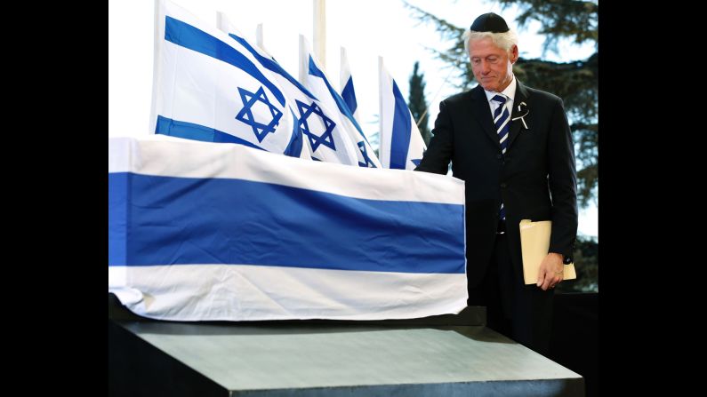 Clinton touches Peres' coffin. Clinton spoke fondly of Peres, adding in his eulogy: "He knew exactly what he was doing in being overly optimistic. ... He never gave up on anybody, I mean anybody."